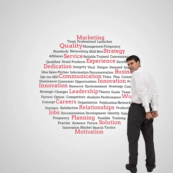 Young businessman wearing handcuffs — Stock Photo, Image