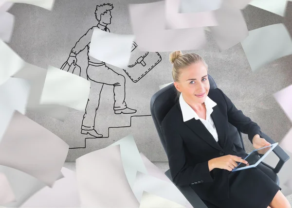 Composite image of businesswoman sitting on swivel chair with tablet — Stock Photo, Image