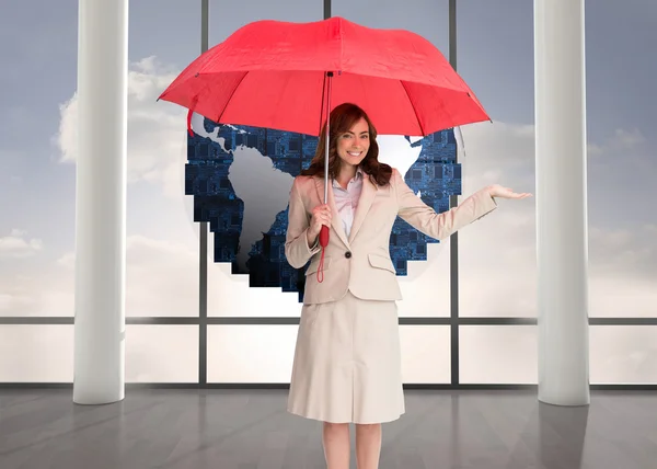 Businesswoman holding umbrella — Stock Photo, Image