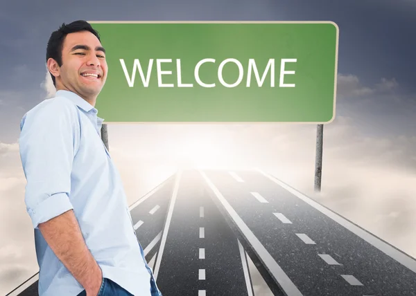 Image composite d'un homme souriant et décontracté debout — Photo