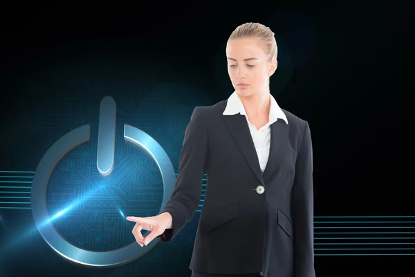 Composite image of businesswoman pointing somewhere — Stock Photo, Image