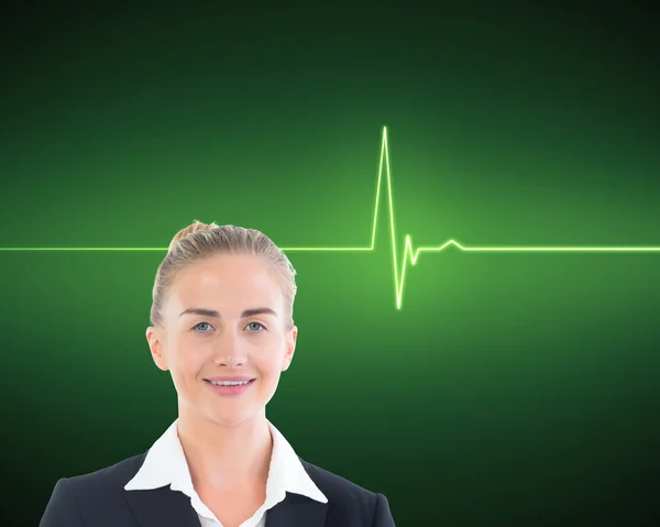 Composite image of businesswoman holding tablet — Stock Photo, Image