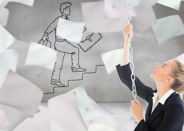 Composite image of businesswoman pulling a chain — Stock Photo, Image