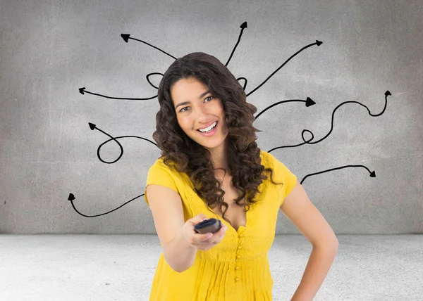 Woman changing channel with remote — Stock Photo, Image