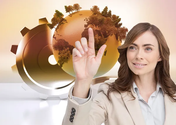 Smiling businesswoman pointing — Stock Photo, Image