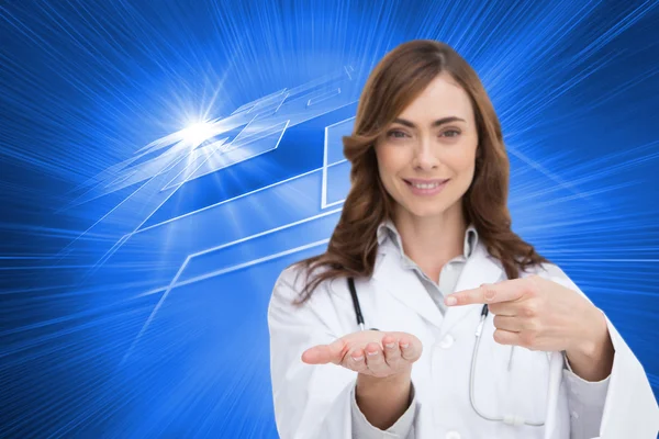 Médico sonriente presentando su mano — Foto de Stock