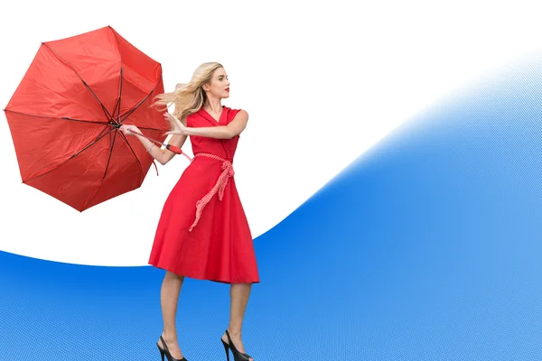 Obraz kompozytowy elegancka blondynka gospodarstwa parasol — Zdjęcie stockowe