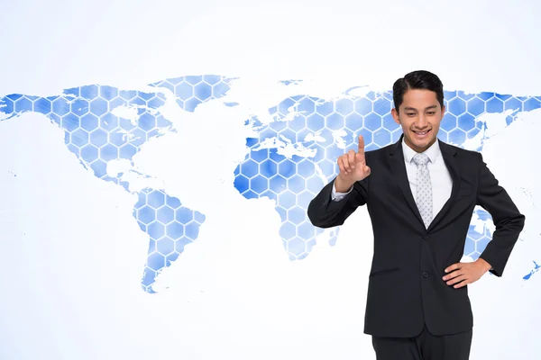 Sammansatt bild av leende asiatisk affärsman pekar — Stockfoto