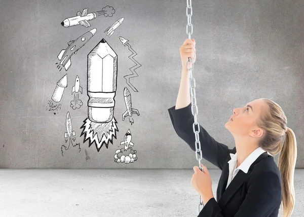 Composite image of businesswoman pulling a chain — Stock Photo, Image