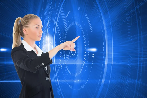Composite image of businesswoman pointing somewhere — Stock Photo, Image