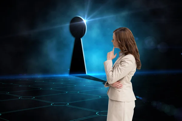 Composite image of profile view of doubtful businesswoman standing — Stock Photo, Image