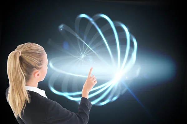 Composite image of businesswoman pointing somewhere — Stock Photo, Image