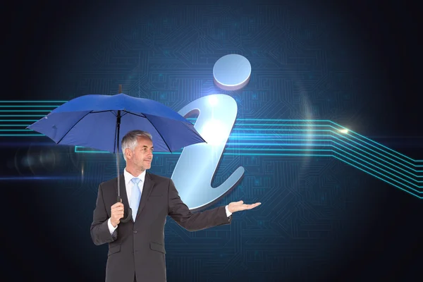 Composite image of happy businessman holding umbrella — Stock Photo, Image