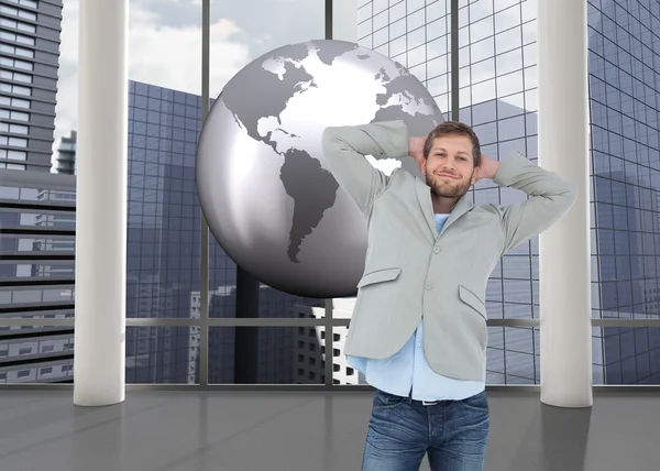 Suave man in a blazer with hands behind head — Stock Photo, Image