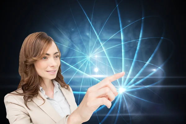 Composite image of businesswoman pressing an invisible key — Stock Photo, Image