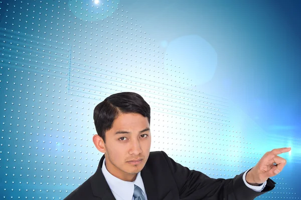 Sammansatt bild av bister asiatiska affärsman pekar — Stockfoto