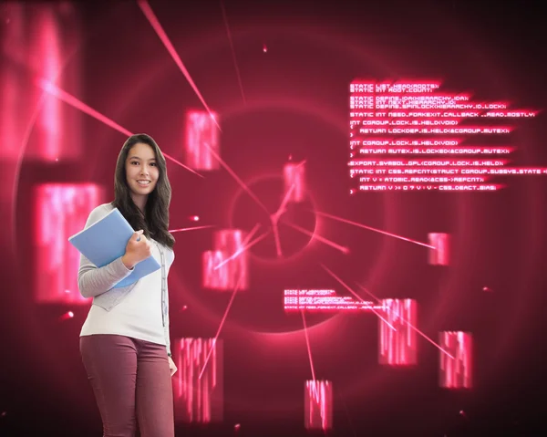 Student standing in a computer room and holding a folder — Stock Photo, Image