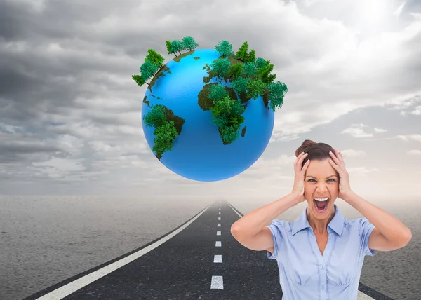 Stressed businessswoman with hand on her head — Stock Photo, Image