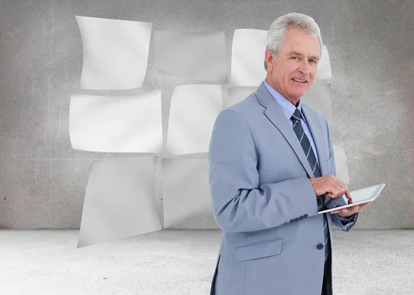 Mature tradesman with tablet computer — Stock Photo, Image