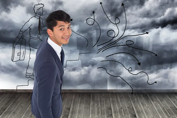 Composite image of smiling casual businessman walking — Stock Photo, Image
