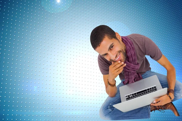 Thoughtful man using laptop — Stock Photo, Image