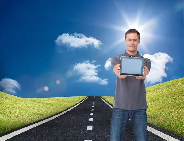 Man showing screen of his tablet computer — Stock Photo, Image