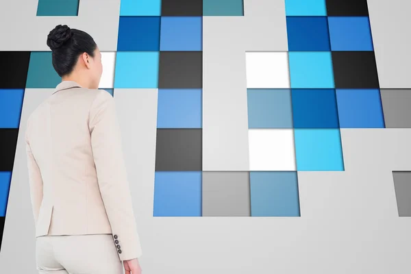 Composite image of asian businesswoman walking — Stock Photo, Image