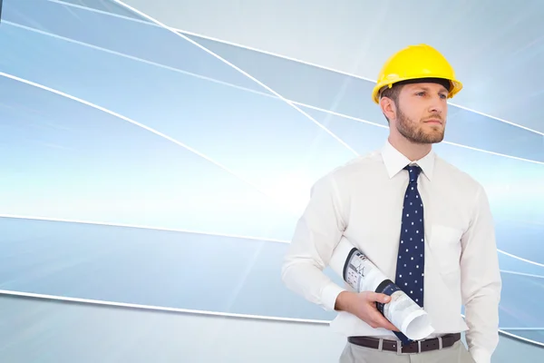 Architect posing with hard hat and plan — Stock Photo, Image