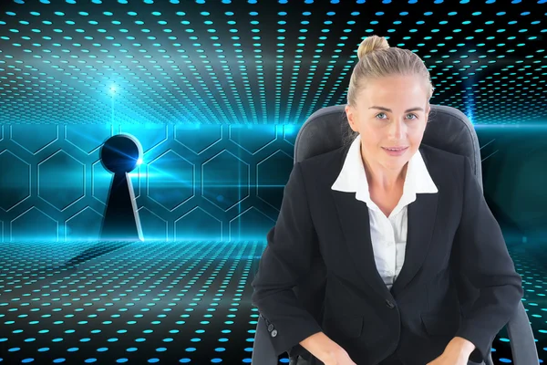 Composite image of businesswoman sitting on swivel chair with la — Stock Photo, Image
