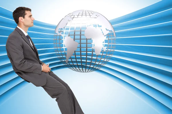 Classy young businessman sitting — Stock Photo, Image
