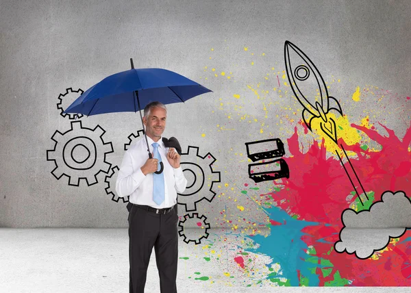Composite image of happy businessman holding umbrella — Stock Photo, Image