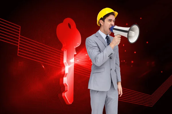 Jovem arquiteto gritando com um megafone — Fotografia de Stock