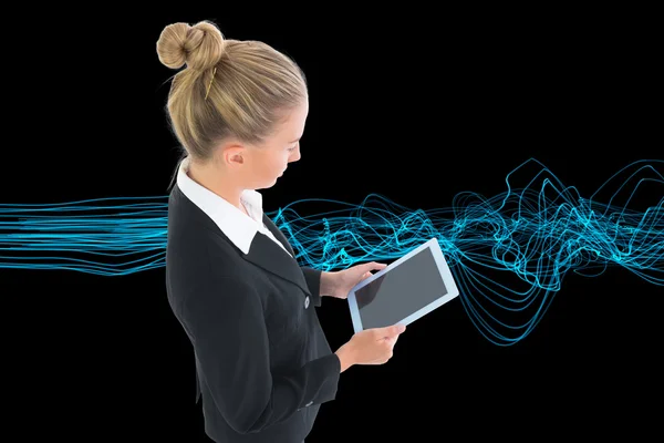 Composite image of businesswoman holding new tablet — Stock Photo, Image