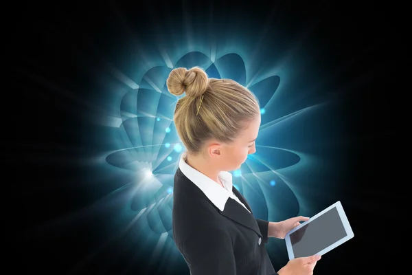 Composite image of businesswoman holding new tablet — Stock Photo, Image