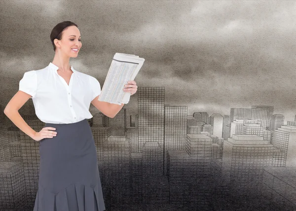 Stylish businesswoman holding newspaper — Stock Photo, Image