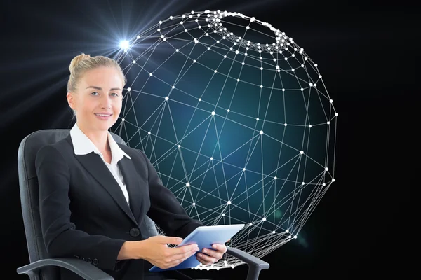 Composite image of businesswoman sitting on swivel chair with tablet — Stock Photo, Image