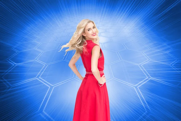 Composite image of smiling blonde turning — Stock Photo, Image