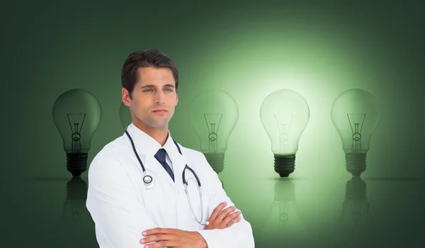 Serious doctor with arms crossed — Stock Photo, Image