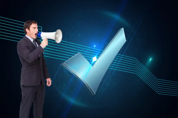 Businessman shouting through megaphone — Stock Photo, Image