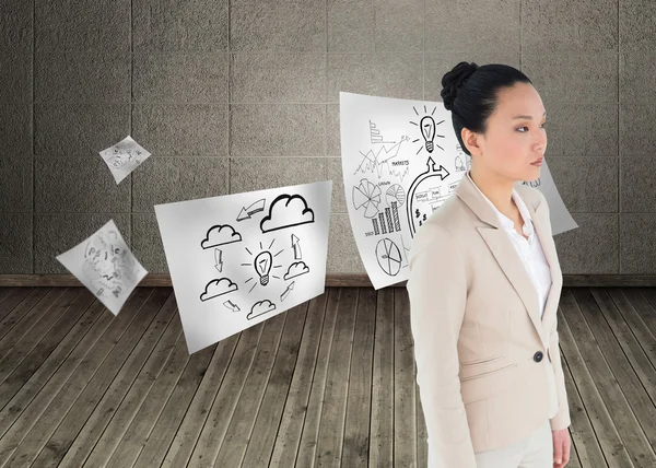 Composite image of unsmiling asian businesswoman — Stock Photo, Image