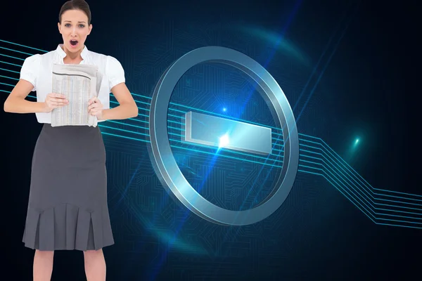 Composite image of shocked stylish businesswoman holding newspap — Stock Photo, Image