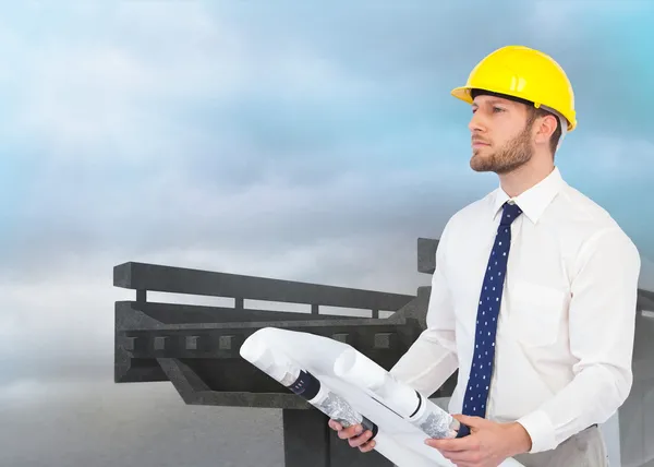 Composite image of thoughtful young architect posing — Stock Photo, Image