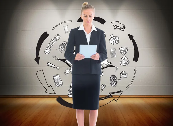 Composite image of businesswoman holding new tablet — Stock Photo, Image