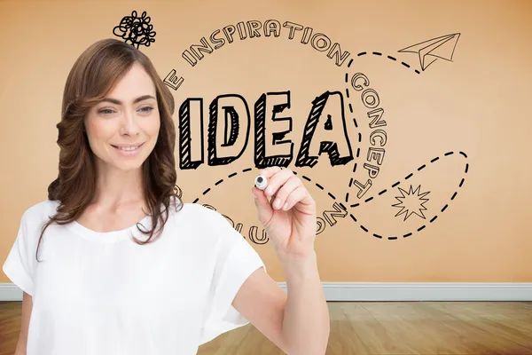 Composite image of smiling businesswoman holding marker — Stock Photo, Image