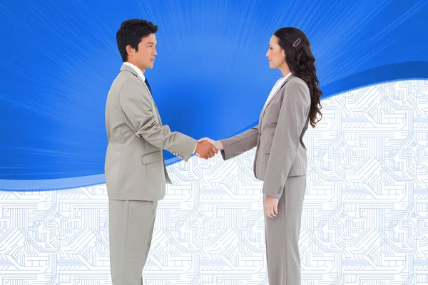 Hand shaking trading partners — Stock Photo, Image