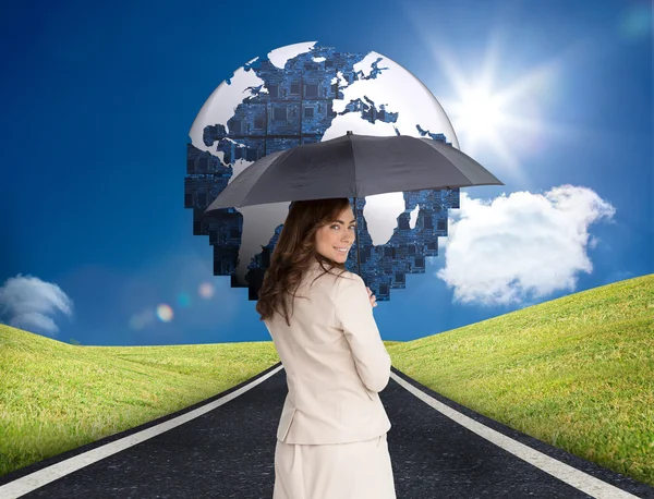 Classy businesswoman holding umbrella — Stock Photo, Image