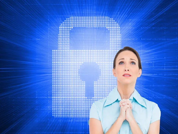 Young businesswoman praying — Stock Photo, Image