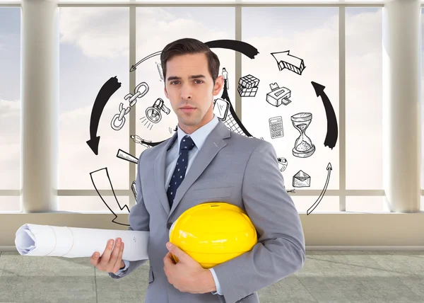 Serious architect holding plans and hard hat — Stock Photo, Image