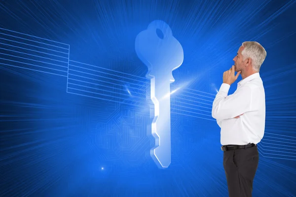 Composite image of thoughtful businessman posing — Stock Photo, Image