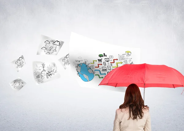 Composite image of businesswoman standing back to camera holding — Stock Photo, Image